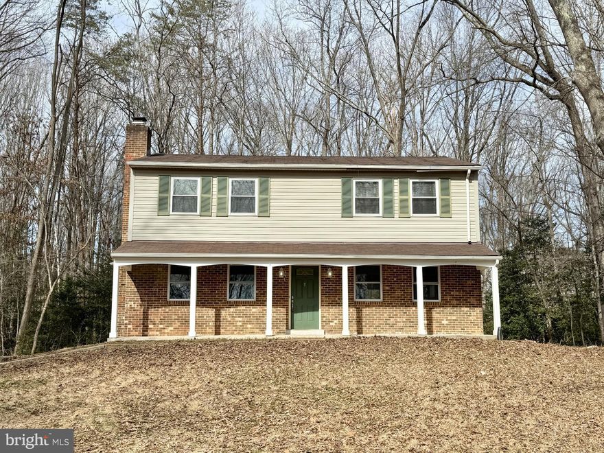 Country setting in the heart of Stafford county. Recently renovated, four bedroom, two and a half bath country house! Beautiful! Stainless steel appliances, open kitchen, separate formal dining room. Almost 2 acres of privacy yet close to shops, dining, and schools. Cozy family room with hardwood floors and brick fireplace. Separate formal living/dining area. Brand new bathrooms. private yard and rear stamped concrete deck!