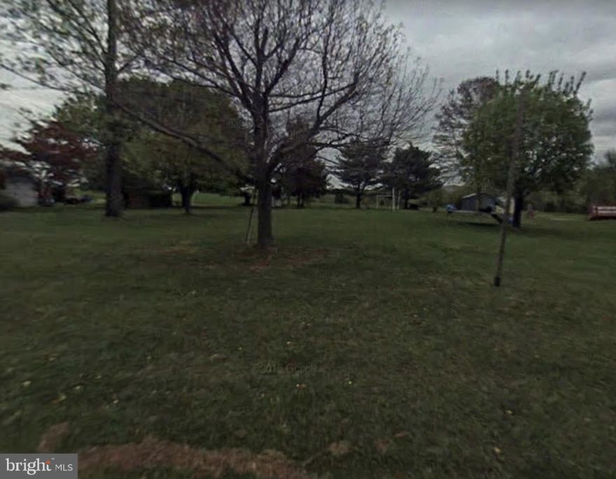 Beautiful .46 acre building lot! Build the home of your dreams here! Raw land, perc test required