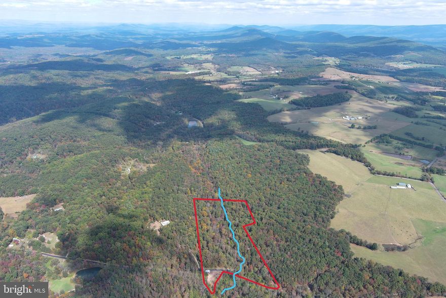 NO RESTRICTIONS + NO HOA = NO PROBLEMS! 16.5 UNRESTRICTED ACRES WITH A LITTLE BIT OF EVERYTHING; SEASONAL STREAM, GOOD TOPO, WELL, ELECTRIC, PAVED ROAD FRONTAGE. LONG DRIVEWAY THROUGH WOODS LEADS TO CAMP/BUILD PAD OR TAKE ADVANTAGE OF WELL & ELECTRIC AT THE OLD HOUSE, A COUPLE OPTIONS TO PULL IN YOUR CAMPER IMMEDIATELY. TINY HOME, BIG HOME, MOBILE HOME, MODULAR HOME.....BUILD WHATEVER YOU HAVE IN MIND. PERFECT HOME BASE FOR THE RV CROWD....EASY ACCESS VIA WIDE PAVED COUNTRY ROAD. HUNT, SHOOT, ATV'S....YOU CAN DO ALL THE FUN STUFF HERE.....NEW SURVEY....GREAT COUNTRY LOCATION BUT NOT FAR FROM ANYTHING. IT'S NEXT TO IMPOSSIBLE TO FIND UNRESTRICTED PROPERTY THESE DAYS.....HERE'S YOUR CHANCE TO LIVE FREE WITH NO RULES, RESTRICTIONS OR RESPONSIBILITIES!