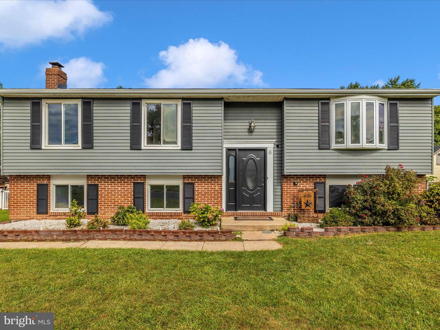 Looking for a 4 bedroom 2 bath home with a fenced level yard?? This is it.  Seller has updated home with new laminate flooring throughout,  custom painted kitchen cabinets and butcherblock peninsula/island.    Roof and Gutters 4 years new!  Reclaimed wood entry!  Rear deck is large and freshly stained.  Interior is freshly painted.  Do not hesitate!