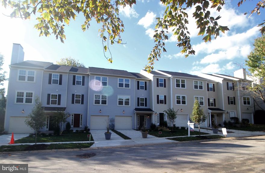 Columbia Builders NEW Townhome in Clary's Forest. Fully finished, 3 levels above grade. Garage, ceramic entry, powder rm, family rm w/ gas fireplace, walk out to yard. 2 Hardwood Staircases, Main Level Hardwood Flooring, Gourmet Kitchen: SS Double Oven, Gas Cooktop, Chimney Hood, Microwave, Frig, DW, Granite tops, 10' island. Owner Bath & Walk In Closet. $10,000 to Closing Costs w/apprvd Lender