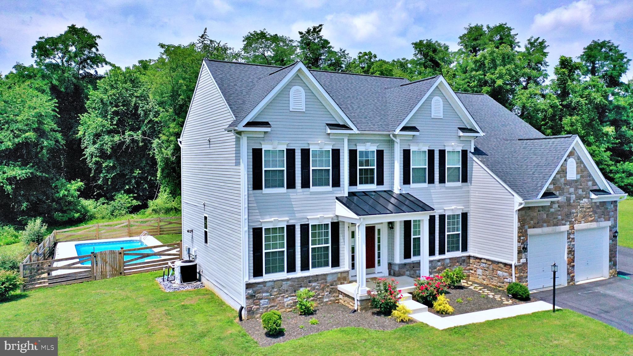 Just a few short miles west of historic Charles Town, WV, in the highly sought after community, The Preserve at Barleywood, on a whopping 3 acres, you will find this glorious 4500 square foot 4 bedroom 4.5 bath with an alluring in-ground swimming pool, enchanting morning room, gourmet kitchen with stunning granite countertops, stunning formal crown molded dining room, French door enclosed office, enormous master bed & bath featuring separate vanities, exquisite soaking tub and independent shower, fully finished walk-out basement complete with full kitchen and massive space to bring those table games, giant screens, plush couches, indoor playsets and more. What a wonderful time of year to visit this remarKABLE home and stroll about in this magnificent community's delightful nature trail and winding streets.