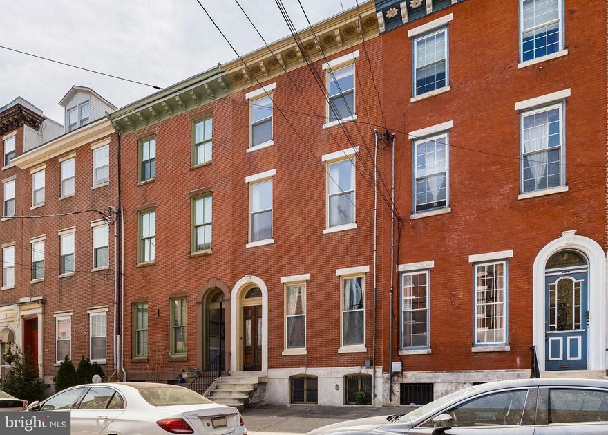 Welcome to 756 S. 10th Street, a beautifully located five-bedroom, three-and-a-half-bath townhouse offering over 3,600 square feet of stunning living space in the heart of Philadelphia’s sought-after Bella Vista neighborhood. Perfectly situated just steps from Whole Foods, the Italian Market, Palumbo Park, and the iconic Dante & Luigi’s restaurant, this home places you within easy walking distance of every modern convenience the city has to offer. Blending classic Philadelphia charm with recent modern upgrades, this spacious residence showcases high ceilings, large sun-filled rooms, and thoughtful finishes throughout. The expansive floor plan features an updated kitchen with contemporary cabinetry and stainless steel appliances, generously sized bedrooms, and beautifully appointed bathrooms. The primary suite offers a luxurious retreat with ample closet space and a spa-inspired bathroom. Additional highlights include hardwood floors throughout, recessed lighting, a finished lower level offering extra living space or flexible use, and a private rear outdoor area—perfect for entertaining or relaxing in the city.  Offered at an unbelievable price for this premier location and square footage, 756 S. 10th Street presents an incredible opportunity to own a turnkey home in one of Philadelphia’s most vibrant and walkable neighborhoods. Don’t miss your chance to call Bella Vista home!