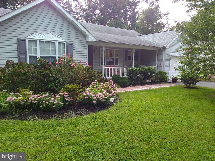 **PRICE REDUCTION**Priced to sell** Cloverfields-4BED, 2.5BATH, attach Garage w/attic. Rancher. Large living room, sep dining and eat in kitchen. Master bath w/whirlpool tub, Lg room w/french doors as possible den or 4th bedroom. Step out on the deck to a large fenced in yard. NEW hot water heater**water/sewer benefit assess pd in full.