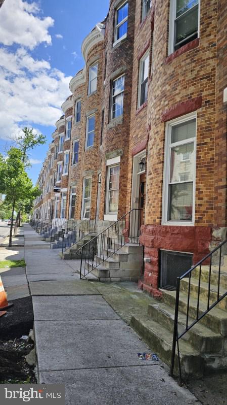 This multi-unit residential property at 307 E 22nd St, Baltimore, MD 21218, presents a compelling investment opportunity. Featuring three 2-bedroom units with the potential to convert the basement into a fourth unit, this property offers significant value. It boasts four separate meters and is certified lead-free for life, ensuring compliance with health regulations and ease of utility management. While the second unit has sustained some damage and requires repairs, the property's prime location is known for accessibility and potential grants for renovations. This property, located in a desirable neighborhood, is ideal for those looking to invest in Baltimore's dynamic real estate market.