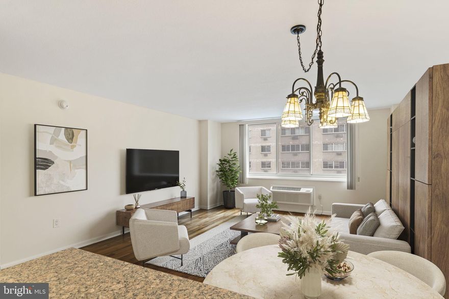 Welcome to this beautiful, sunny, south-facing studio offering  517.77 sq. ft. of thoughtfully designed living space. Enjoy stunning wood cabinetry in the kitchen, rich wood floors throughout, and an updated bathroom with modern finishes. Plus, the convenience of a WASHER and DRYER right in the unit makes everyday living effortless! The Kennedy House offers a full-service lifestyle defined by comfort and sophistication. Residents enjoy a 24-hour security, concierge, onsite management, and an attached garage. The crown jewel of the building is its spectacular rooftop pool, showcasing breathtaking panoramic views of the Philadelphia skyline. Additional amenities include a fully equipped fitness center, community room, hospitality suites for guests, bike storage, library, and laundry facilities. Your monthly fee delivers remarkable value, covering real estate taxes, electricity, air conditioning, heat, water, basic cable TV, and access to both the rooftop pool and fitness center — offering effortless, all-inclusive living. Convenience is unmatched. Located just blocks from Suburban Station and Amtrak’s 30th Street Station, with multiple bus lines at your corner, commuting is seamless. World-class dining, upscale shopping, renowned museums, and cultural landmarks are all just steps from your door. Enjoy the added luxury of having Kennedy Food Garden and na Brasa Brazilian Steakhouse located within the building itself. This is a cooperative building requiring board approval. Buyers must present strong financials and a credit score of 700+. Please note: no subletting permitted. The building allows cats, and/or birds, but only 2 pets per residence.  The building also allows fully documented assistance animals. A one-time administrative fee of $10,355.40 applies, with nominal fees for parking and hospitality suites. Elevated city living awaits at The Kennedy House — where luxury, location, and lifestyle converge.