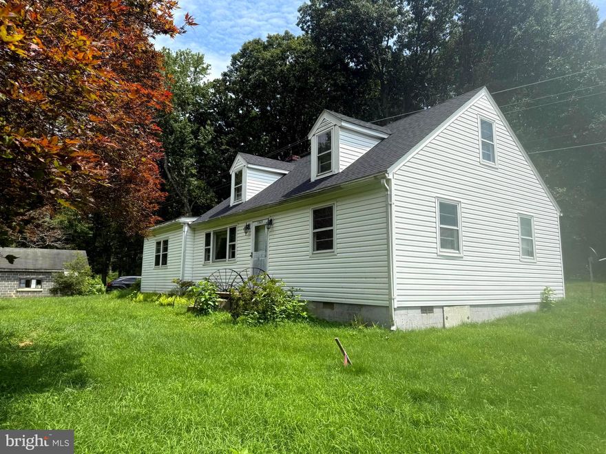 LISTING INCLUDES: House is 10619 Catharpin Rd,  and Garage and Building lot is 10621  Catharpin Rd.

Charming 4BR/1BA Cape Cod-style home situated on a private 0.5-acre lot in Spotsylvania. This well-maintained 1,244 sq ft property features a spacious family room addition, hardwood and tile flooring, central A/C, and efficient heat pump systems, detached garage and building lot. Enjoy the peace of rural living with no HOA and A-3 zoning—perfect for added flexibility. Private well and septic. Convenient to Rt. 208 and Lake Anna amenities. Ideal for first-time buyers, investors, or anyone seeking a quiet countryside retreat with classic charm.