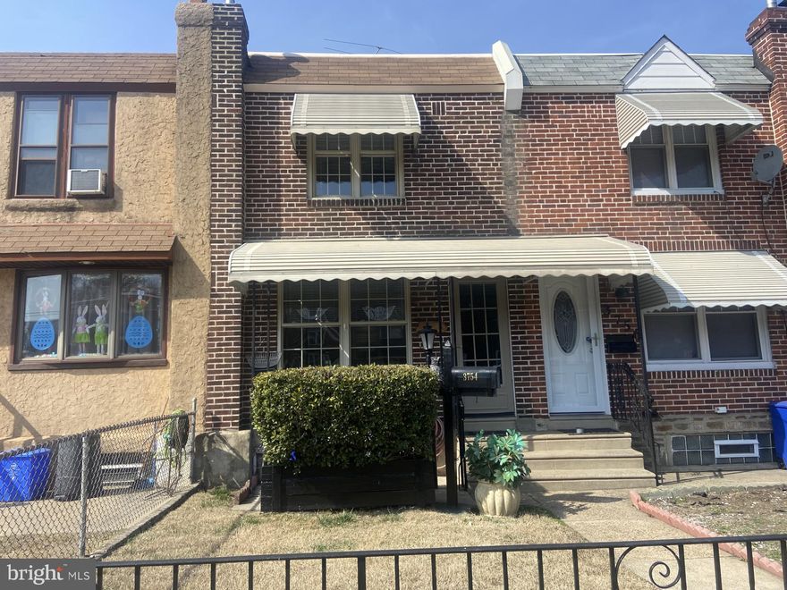 A must-see Bridesburg 2 Bedroom beauty in move in condition. Walk through your front fenced in yard with a covered patio and enter into the Living room-Dining room combo,  modern Kitchen area with wood cabinets, double s/s sink, garbage disposal, formica counters, c/t backsplash, recessed lighting and natural woodwork throughout. Upstairs find 2 spacious Bedrooms with built-in  closets, modern 3 pc. Bath with c/t splash wall, c/t floor and built-in skylight, Front & rear awning, all vinyl replacement windows, rear cement yard with wooden deck and storage shed. The parking area is not part of the subject property but has been used by the owners to park their cars. This beauty won't last! Schedule your showing today!