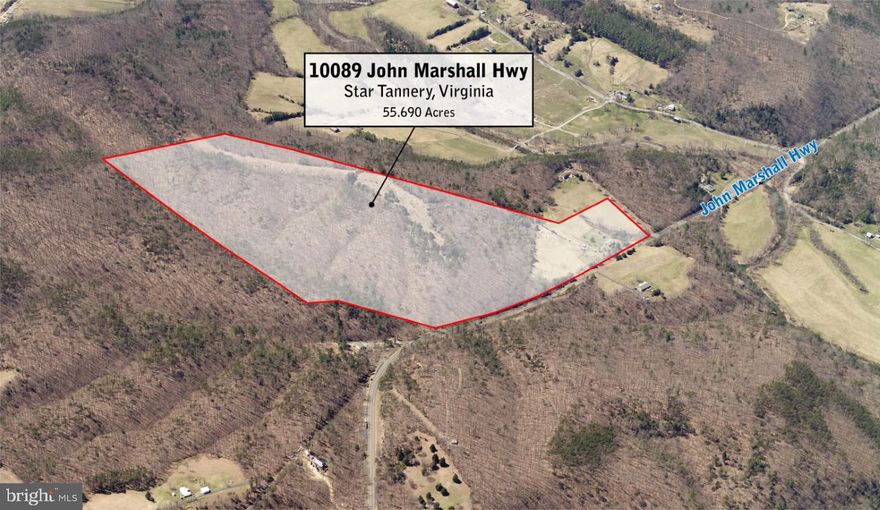 Country living with easy City access!   Ready for your cattle, horses, livestock!!  55+/- acres - approx half wooded and half open pasture.  There is a small pond, a run-in shed for horses, automatic water system for livestock, two double carports.  Both outbuildings have power. This one owner quality built all brick home  has 3 bedrooms and 2 full baths. One full bath upstairs and one full bath in unfinished walk-out  basement. Great storage space in basement with metal shelving for canning, supplies, etc. Hardwood floors. Woodstove in unfinished basement conveys as is. The potential for this property is endless!  Winery, Vineyard, Wedding/Event Venue, AirBnB potential is HUGE.......Crops, Animals, Flowers.....Lots of road frontage on John Marshall Highway! Just a few minutes from the Interstate and I-66 making it an easy  drive into DC.  Several potential home sites!!Professional Photos to be uploaded tomorrow.  Seller is related to listing agent.