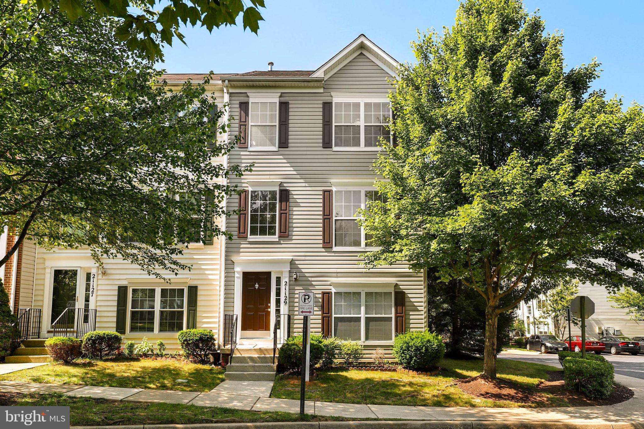 WELCOME HOME! Move-in ready. Exquisitely renovated and no expenses spared. Priced to go. Gorgeous recently renovated ($40k costs) and upgraded end-unit colonial with 2-car garage in the popular and vibrant Milestone II Condo TH subdivision. Ryland Homes, Wyngate model. New fresh coats of paint, and satin nickels fixtures galore. Brand new wood floors and carpet on upper level. Fireplace provides warmth comfort. Sunlit all around. High ceiling with tasteful chandelier adorns HW foyer entrance. Wide open kitchen with porcelain tile, which boasts burner stove, granite counter tops, brand-new appliances. Cathedral ceiling and ceiling fan in master's bedroom, with his/hers walk-in closets, and cozy luxurious bath's soaking tub to de-stress at day's end. Tile floors in guest baths, with upgrade vanities and counters. Garage offers plenty of storage space. NEW: Flooring, carpet, WC bowls ('19), range hood & stove ('19), roof ('18), HVAC ('15). Low condo fees cover pool and tennis, among other amenities! Minutes to I-270 and The Pike. Don't procrastinate... or you'll lose it!