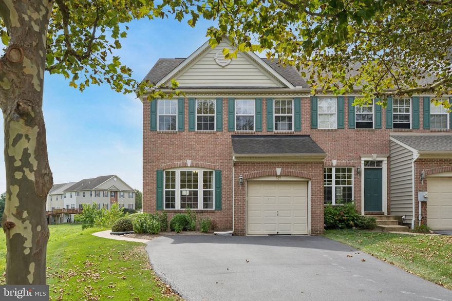 Welcome to 190 Penns Manor Drive, a beautifully updated end-unit townhome in the highly desirable Penns Manor community of Kennett Square. Perfectly positioned with sunset views and open space, this 3-bedroom, 2.5-bath home offers a one-car garage, finished walk-out basement, and move-in-ready convenience. The main level greets you with a dramatic two-story foyer and an abundance of natural light from walls of windows that showcase the private setting. The dining room centers the space with a striking gas fireplace and flows easily into the eat-in kitchen, complete with granite countertops, stainless steel appliances, a large island, and access to the new Trex deck (2023)—ideal for entertaining. A spacious family room, powder room, and laundry with garage entry complete this level. Upstairs, retreat to the primary suite with vaulted ceilings, a walk-in closet, and a luxurious bath featuring double vanity, soaking tub, and a newly updated glass shower. Two additional bedrooms and a full hall bath offer plenty of room for family or guests. The fully finished walk-out basement expands your lifestyle options with flexible space for a gym, office, or media room, plus extra storage. Additional highlights include a brand-new HVAC system (2023), low HOA fees, and a prime location close to downtown Kennett Square’s restaurants and shops, with easy access to Routes 1 and 202, West Chester, and Wilmington. Stylish, spacious, and turnkey—190 Penns Manor Drive is ready to welcome you home.