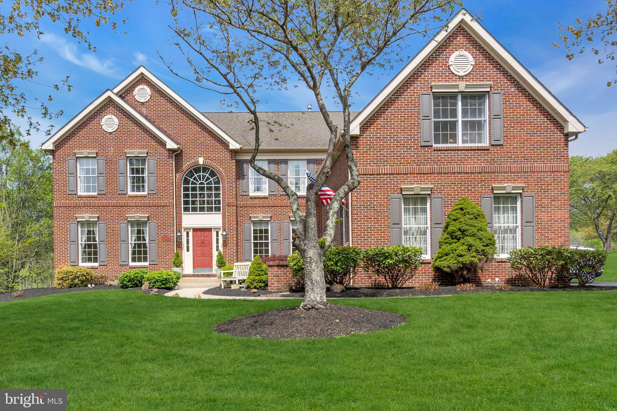 Welcome to 1205 Withers Way, an exceptional residence offering a rare combination of timeless design, modern updates, and an unbeatable location just minutes from vibrant downtown West Chester. Lovingly maintained by its original owners, this elegant home is nestled in the highly coveted Brandywine River Estates, surrounded by natural beauty and serene privacy.
From the moment you arrive, the home's stately presence is unmistakable. A dramatic two-story foyer with a sweeping rounded staircase sets a sophisticated tone, while rich hardwood floors flow throughout the main level. Formal living and office spaces flank the entrance, providing versatile options for work at home or a quiet retreat.
The true heart of the home lies beyond: a stunning open-concept family room and gourmet kitchen, thoughtfully designed for gathering and entertaining. The soaring two-story family room is anchored by a magnificent stone gas fireplace and an expansive wall of windows, flooding the space with natural light and offering beautiful views of the expansive, lush backyard that seamlessly opens to preserved community green space and distant woodlands. Glass doors open to an oversized deck, creating an effortless flow for indoor-outdoor living.
The recently refreshed gourmet kitchen will delight any chef, featuring all new stainless-steel appliances, a Blanco sink, granite countertops, a walk-in pantry, and stylish new lighting fixtures. A gracious dining room, ideal for hosting holiday celebrations and formal dinners, connects beautifully to the kitchen.
Completing the main level are a powder room, a spacious laundry area, a coat closet off the 3-car garage entry, and a seamless layout designed for everyday living and entertaining. Dual staircases—one from the foyer and another from the family room—enhance the home's effortless flow between levels.
Upstairs, the luxurious primary suite feels like a private retreat, offering a sitting area, dual walk-in closets, and a spa-inspired en-suite bath with a soaking tub, glass-enclosed shower, dual vanities, and a private water closet. The second bedroom functions as a private suite with its own full bathroom, while two additional bedrooms share a well-appointed Jack-and-Jill bath. Each bedroom is generously sized and boasts walk-in closets, providing ample storage and comfort.
The bright, walkout lower level offers endless possibilities for customization—whether finished as additional living space or utilized for abundant storage. The updated, three-zone HVAC system provides year-round comfort and cost-effective climate control throughout the home.
Set on a picturesque lot backing to expansive, protected open space, 1205 Withers Way offers exceptional privacy within an established, sought-after neighborhood, while providing sweeping views and a true connection to nature. Enjoy access to scenic walking trails in the neighborhood or along the nearby Brandywine River, while the bustling shops, dining, and events of Downtown West Chester are just minutes away. Major routes including Route 202, 322, and 1 are easily accessible, offering a stress-free commute to Philadelphia, Delaware and beyond.
This is a rare opportunity to own a truly turnkey, lovingly maintained estate home in one of West Chester’s finest communities.