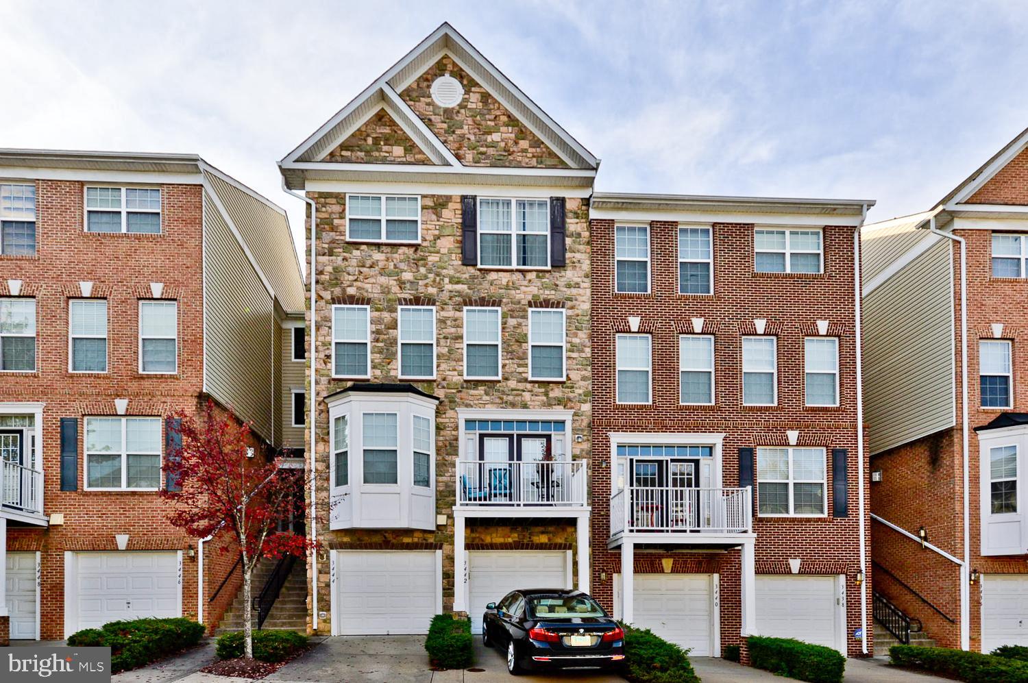 Lovely 4 level garage townhome in the Russett Community. Spacious, gourmet kitchen with updated cabinets, granite countertops, and stainless-steel appliances. Decorative crown, chair molding, with wainscoting! Huge, private main suite situated on its own floor with walk-in closet and pull-down attic for extra storage. Spa-like main bath with dual sinks, updated bathroom cabinets. Separate shower with soaking tub. Look for your laundry room conveniently located on the upper level. Garage parking and driveway. Private balcony. Located literally right off Baltimore/Washington Parkway, it's a commuter's dream! So much to do without leaving the Russett Community: Swimming pool, library, walking/biking trails, tennis courts, volleyball and basketball courts, tot lots, onsite daycare. Plenty of major shopping nearby: Super Walmart, Sam's Club, Target, and so much more.