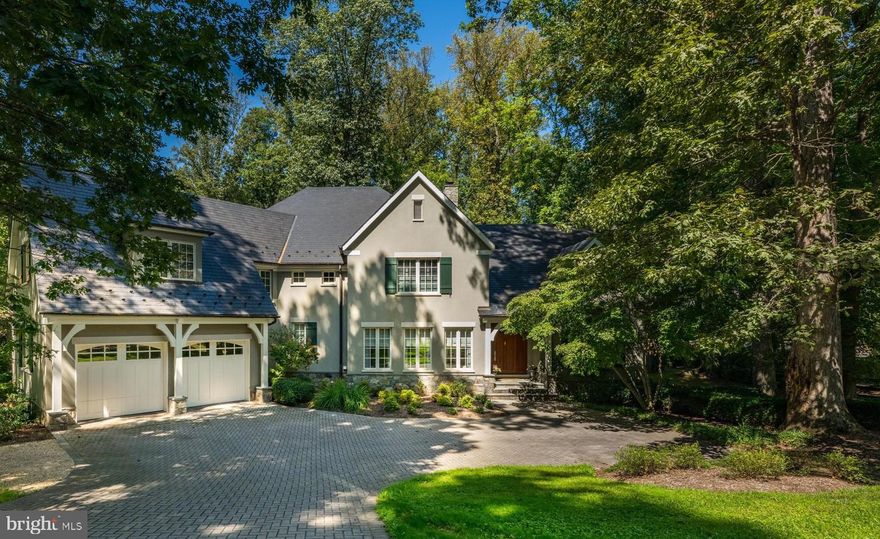 Prepare to be enchanted from the moment you arrive...how do you begin to describe the exceptional construction quality of a home like this?  A  home that won the Maryland Building Industry- Award of Excellence- for custom construction.  The level of attention to detail is nearly impossible to capture in words-it simply has to be experienced to be believed.  And beyond the home itself, this beauty is nestled within the coveted community of Merry-Go-Round Farm - a setting defined by rolling fields, preserved natural landscapes, and a true sense of pastoral serenity.  A sense of community envelopes you with Fourth of July activities, a festive Hallowe'en celebration and so much more, cherished traditions bringing everyone together, creating bonds that make this neighborhood feel more like family than simply a place to live.  Here, horses graze in wide-open pastures, neighbors enjoy miles of trails , and the equestrian center continues the timeless charm of the Potomac hunt country.  From the handsome exterior stone and stucco finish to copper gutters and a slate roof, architectural beauty is on display at every turn.  The rear of the home is as attractive as the front! Inside, the show-stopping eat-in Gourmet Kitchen truly feels like the heart of the home.  A generous center island topped with beveled granite, high-end stainless steel appliances and abundant Decora cabinetry provide both elegance and function.  The field stone gas fireplace next to the eating area adds warmth and ambiance, while the private year round porch invites you to relax in a tranquil, tree-lined sanctuary.   The main level reflects a consistent focus on quality and comfort.  From the marble and wood inlay floors of the foyer, to the soaring two-story Family Room with a stunning floor-to-ceiling stone fireplace, every space is thoughtfully designed.  Front and back staircases, substantial crown and base moldings, a butler's pantry, and a spacious mudroom with a wall of built-ins further elevate your daily living.  Upstairs, the sumptuous Primary Suite is a true retreat.  With a vaulted ceiling, private reading room and a huge walk-in closet, it is both gracious and intimate.  Four generously proportioned bedrooms, each with its own en-suite bath, and a smartly designed laundry room complete the upper level.  Oh! Don't miss the outdoor deck where you can escape to the treetops. The daylight, walk-out Lower Level offers endless flexibility with a sprawling recreation room, an exercise room, a private bedroom/au pair suite with full bath plus additional bonus space to create a media room or wine cellar as you desire.  As throughout the rest of the home, the finishes are of the highest quality, with wonderful ceiling heights and an abundance of space.   The rear yard with a flagstone terrace and tall, towering trees backs to greenspace and, unlike many homes in Merry-Go-Round,  can accommodate an inground pool if that is on your wish list.   This residence is more than just a home - it's a statement of craftsmanship, livability and timeless design.  A property of this caliber, with such an uncompromising level of finish, simply cannot be recreated in today's market at this price.  Don't miss this rare opportunity to own a home that enchants, inspires, and elevates your everyday living - make it yours today!