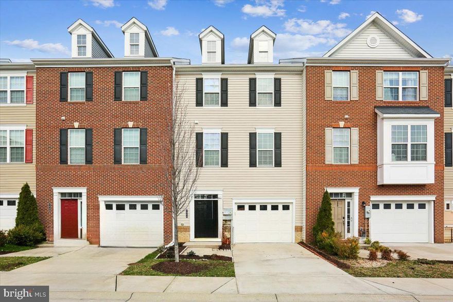 Welcome to 7944 John Galt Way, a beautifully maintained townhouse with a garage in the desirable Morris Place community of Elkridge. Built in 2018, this townhome is one of the largest in the community and offers approximately 2,400 square feet of thoughtfully designed living space that balances modern comfort with everyday functionality.
The main level features an open-concept layout that connects the living room, dining area, and kitchen into one bright, welcoming space. Large windows allow natural light to fill the home, creating an airy, inviting atmosphere that works equally well for daily living and entertaining. The gorgeous kitchen, with bar seating, makes it easy to stay connected with guests and family while preparing meals. Recent updates, including fresh paint throughout, brand new carpet, and a new stove, give the interior a clean, move-in-ready feel.
The upper level features three spacious bedrooms, two full baths, and a conveniently located laundry closet. The primary bedroom is a true retreat with ample square footage, a bathroom with dual sinks, and a walk-in closet. The finished basement, complete with a full bathroom, expands the home’s versatility. It features a walkout entrance and flexible space that works well for a home office, recreation area, or guest suite.

Beyond the home itself, Morris Place offers a welcoming neighborhood setting with amenities designed for an active lifestyle. Residents enjoy access to a large dog park, playgrounds, picnic areas, and scenic walking and jogging paths. The community’s green spaces make it easy to enjoy the outdoors and connect with neighbors. Best of all, the ample parking ensures residents and guests have plenty of space, so parking is never a concern.
The location adds even more appeal, with quick access to major commuter routes such as I-95, I-295, Route 100, Route 175, Route 32, and Route 29. Enjoy easy access to a wide range of outdoor recreation venues including Troy Park, Rockburn Branch Park, Lake Elkhorn, Blandair Regional Park, Merriweather Post Pavilion, the Merriweather District, and the Columbia Lakefront. Conveniently located near numerous shopping and everyday essentials such as Costco, Trader Joe’s, ALDI, Walmart, Target, Giant, Starbucks, MOM’s Organic Market, Home Depot, Lowe’s, Wegmans, Whole Foods, Arundel Mills, and The Mall in Columbia, and Howard Square is just down the road. Located within the Howard County Public School System. Welcome home!


 Combining modern design, recent updates, community amenities, and a highly convenient location, 7944 John Galt Way offers a comfortable and well-rounded place to call home.