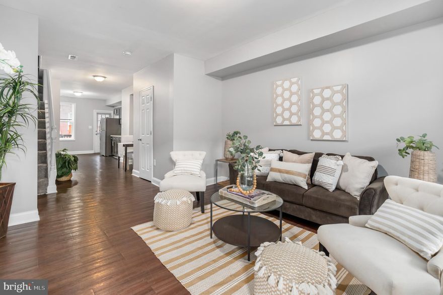 Seller concessions of $5,000 available with $164,990 offer! This renovated porch front home has been designed with modern features and classic finishes on a beautiful street in the Better Waverly Historic District!  Gleaming hardwood floors throughout the open floor plan from the spacious living room to dining area through to the large gourmet kitchen with sleek granite countertops, stainless steel appliances, gas stove and back door to your deck and patio for barbecuing and entertaining!!  There is a half bath on the main level and upstairs is the spacious primary bedroom and 2 more bedrooms and a full bathroom with a tub and shower. Laundry is on the lower level and is a great space for a gym, office or media room.  Nearby shopping, restaurants and easy access to downtown and the expressway.  Schedule your tour today!