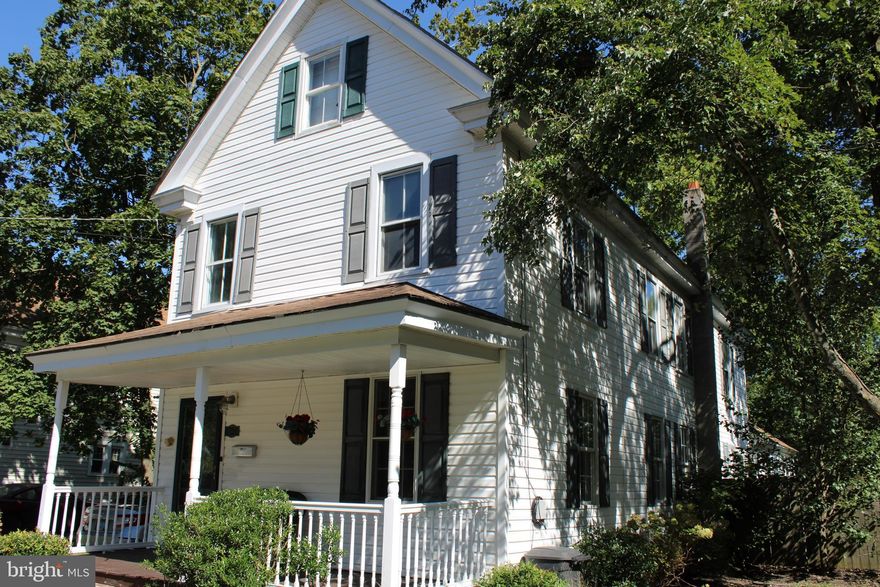 Charming fully renovated historic home in downtown Denton.  One of a kind four bedroom house with a mixture of old and new.  Three different sitting areas for all kinds of weather!  Welcoming front porch and lead glass panel front door.  Original woodwork and hardwoods in front hall and front dining/music room.   Bricked in sidewalk, foundation is bricked in with vents. Brick hearth vented for wood stove. Gravel driveway with enough room for two cars plus two car parking pad off rear alley.  Home features include: Granite countertops, glass backsplash, wood kitchen cabinets, double sink,  greenhouse window, stainless steel appliances; Frigidaire dishwasher that's barely been used, Frigidaire  microwave and refrigerator with ice maker. GE range.  Large kitchen island with pendant lights.  Side screened porch with custom made doors with adjustable shades. Beautiful, light filled custom built sunroom addition with heated hardwood floor and access to backyard.  Office with French doors wired for cable and Wifi. Workshop shed with electric, work bench, shelving and storage cabinets.  Outdoor storage closet on side of the house.  Fully finished third floor accessed by spiral staircase features Berber carpet and front  and back windows.  Entire house  wired for cable and ADT security system. All freshly painted and new carpeting. Close to Food Lion, Walmart, Walgreens, new Starbucks, Aldi's, medical center, urgent care, PNC Bank & a huge selection of restaurants!
