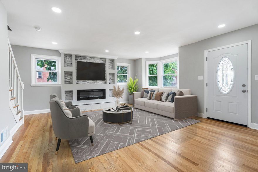 Stunning, fully renovated 5-bedroom, 3 full bath, end-of-group townhome conveniently located minutes from Morgan State University, Towson University, Good Samaritan Hospital, and Towson Town Center. Everything is brand new — including roof, windows, doors, programmable touchscreen thermostat, stainless steel appliances, luxury bathroom fixtures, luxury vinyl plank (LVP) flooring in the basement, original hardwood flooring on the main level and upstairs, and a washer/dryer. This spacious home features a generously sized master bedroom on the main level with an attached full bathroom. The upper level offers 3 generously sized bedrooms and a full bathroom. A fully finished basement with an open concept designer kitchen, granite countertops, and stylish finishes throughout, with a 5th bedroom cum office space, a full bathroom with stand-in shower, and a separate entrance adds extra living space. Enjoy peace of mind with a newer water heater and HVAC system. Expansive private backyard perfect for entertaining. Move-in ready with all the modern updates you’ve been waiting for!