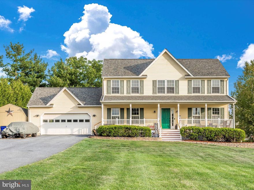 Welcome to this charming and well-maintained home that's ready to steal your heart! Pull up the driveway to find a lovely colonial with a big front porch, giving it a warm and inviting vibe. With 4 bedrooms, 2 full bathrooms, and 1 half bathroom, plus a basement with a full bathroom rough-in, this home has all the space you need.

There's plenty of parking (long Driveway), including a 2-car garage with heat, fans and room for more vehicles. You'll also discover two roomy sheds, perfect for storing your stuff easily.

Step inside to find beautiful hardwood floors on the main level, creating a cozy feel. The living room's fireplace adds extra comfort, perfect for chilly days. The open layout connects the living space to the dining area and kitchen, making it great for get-togethers. And don't forget the back deck – a peaceful spot to enjoy the outdoors.

Downstairs, the finished basement offers even more room to entertain. You'll also find two extra rooms that could become bedrooms, home office, gym, or anything else you'd like.

Sitting on over an acre of land, this home is in a quiet area near parks, entertainment, and dining options. There's always something fun to do!

Recent updates include fresh paint, new carpet upstairs, and updated appliances like the washer, dryer, and fridge. The roof was redone with architectural  shingles in the last couple of years, and the septic system was serviced last year.

This is your chance to own a cozy home with plenty of space and character. Don't miss out – come see it today and imagine all the wonderful things you could do here!