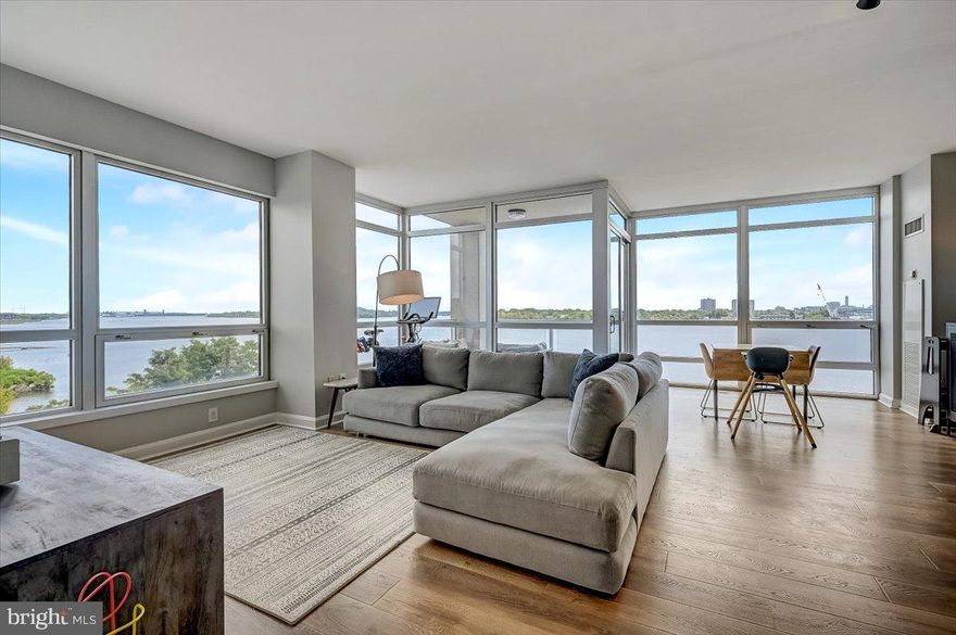A lovely two-bedroom, two-and-a-half-bathroom home features a split floor plan for enhanced privacy and a balcony that directly overlooks the river. GARAGE parking included! Beautiful new floors throughout. Large, open living room and dining room with floor-to-ceiling windows provide wonderful views of the Delaware River. This home has been gorgeously upgraded- see the photos! One of the prettier units currently on the market at this address. Residents of Waterfront Square enjoy an exceptional array of resort-style amenities within a secure, GATED environment. These include parking, a state-of-the-art 12,000 sq ft fitness center with a spa, a year-round 25-meter indoor lap pool with an adjoining riverfront sundeck, a hot tub, sauna, and steam room. Optional yoga and Pilates classes are available. And a new Sprouts market is just steps away! On-site guest parking! The 9.5-acre grounds feature meticulously landscaped gardens, walking, and jogging. Located within the prestigious Waterfront Square at 901 N. Penn Street in Philadelphia, this upgraded residence is situated in The Regatta Building, one of three completed luxury condominium towers within this gated riverfront community. Completed in 2006, The Regatta stands at 29 stories, offering residents stunning views of the Delaware River, the Ben Franklin Bridge, and the Center City skyline. The building features trails, a putting green, and two fenced dog parks, making it a haven for outdoor enthusiasts and pet owners. For convenience, a weekday shuttle service to Center City operates with multiple stops. Resident parking is ample and unassigned, offering ease and accessibility. Waterfront Square's prime location in the Northern Liberties neighborhood provides easy access to the area's vibrant dining, shopping, and entertainment options, as well as major highways and bridges.