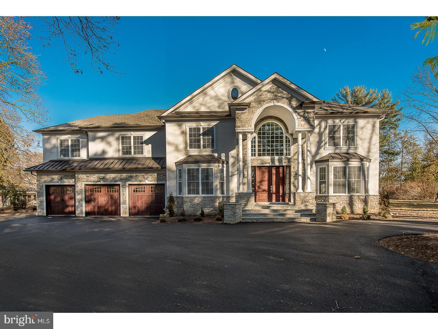 Exquisite new construction in one of the Main Line's most exclusive neighborhoods. This home is a superb blend of modern elegance & impeccable craftsmanship and sits on a level one acre lot. With 6,000 square feet of living space, this home boasts 5 bedrooms, 5 full bathrooms, 1 powder room, an open floor plan, spectacular master bedroom retreat, custom wine cellar, and an abundance of natural light throughout. A gorgeous 2-story entryway gravitates you into a great room with soaring ceilings, gas and stone fireplace, spacious dining room, and family room overlooking the expansive lawn with lush, mature trees. The chef's kitchen exudes sophistication and modern design while showcasing the highest standard of luxury with custom wood cabinets, large center island, top of the line appliances, doubles ovens, and a breakfast nook with access to a side patio. An in-law suite with private bathroom and entrance, study and entry to the 3-car garage complete the first floor. The second level features a luxurious master suite with double door entry, tray ceilings, a balcony overlooking the backyard, his and her closets, en-suite with double vanities, walk-in shower and separate soaking tub. Three additional bedrooms, two with en-suites, sitting room and laundry room complete the upper level. The lower level features plenty of storage space. This amazing home is located in the Award Winning Lower Merion School District. Conveniently located near dining, shopping, entertainment as well as major roadways and public transportation allowing easy commute to Center City.