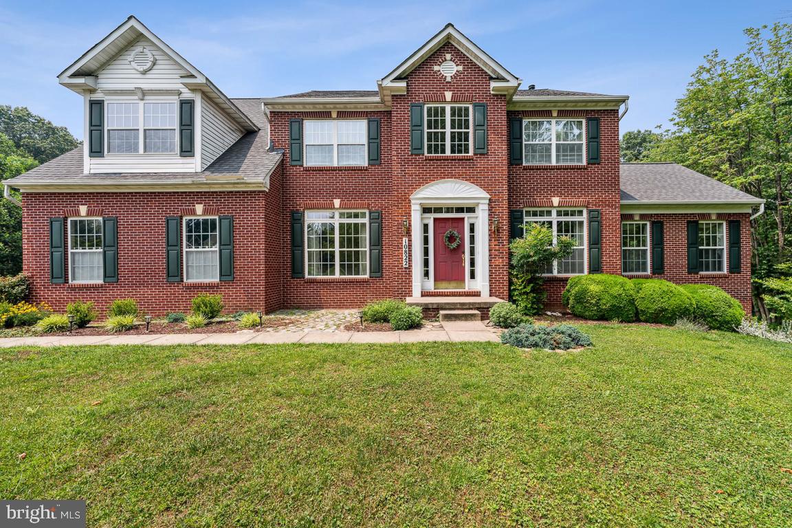 Welcome home to 10822 Avonlea Ridge Place. This beautiful, exceptionally well maintained home nestled in a park like enclave is what you have been waiting for!!! Built by Magruder Homes, this stunning colonial with brick on three sides is solidly built and ready to be home for many generations! Tucked away at the end of cul de sac, this beauty is situated on a spacious 2.2 acre lot which backs to a forest conservation easement. The tree line at the rear of back yard goes back 40 yards before the easement begins for maximum privacy and ensures visits by local wildlife such as white tail deer and wild turkey. The perimeter of the lot also contains wild organic blackberry bushes which attract birds and humans alike! Relaxing on the rear Trex and PVC deck you will have a front row seat to the best that nature provides. Even in wintertime, the owners say that you can see the ground rise up past the stream just on the other side of the forest giving the view of a mountain in the distance!
As you enter the home you are greeted by a generous foyer with beautiful hardwoods which cover the entire first floor. To the left is the formal dining room with a beautiful trim package including crown molding. To the right is the formal living room which boasts the same trim package and same light filled space. The heart of the first floor is the amazing great room which is huge, light filled and ready for any family gatherings or entertaining guests! The gas fireplace is beautiful and adds to the cozy and intimate atmosphere in the great room. Adjacent to the great room is the study which for those working from home offers a perfect place to set up a home office. The kitchen is beautiful with light Maple cabinets, Silestone countertops, a gas cooktop, convection electric oven and a terrific island for meal prep and informal dining. The kitchen also has a generous space for a table for every day dining too. The first floor half bath is privately located and behind the kitchen is the laundry room with a window which floods the space with light.
Located on the first floor as well is the Conservatory. This large room with three sides of many windows is an amazing place to gather, show off your grand piano or any other purpose you may have in mind. The owners say that in a snow storm, you think you are sitting in a snow globe in a magical setting. The Conservatory has it's own dedicated HVAC system as well.
The second floor is bedroom central. The freshly painted and newly carpeted owner's suite is very spacious with an adjoining sitting room which is flooded with light. The owners bathroom is also light filled and features double sinks, an oversized Jacuzzi brand soaking tub and a stall shower. The owners suite also has a massive walk in closet sure to please.
The other three bedrooms are large with spacious closets, one of them a walk in too.
The basement has a huge finished space which will function in various ways to entertain, whether it is a place to set up a home theater space or a pool table. The lower level also has a full basement for full convenience.
One year Cinch home warranty included.