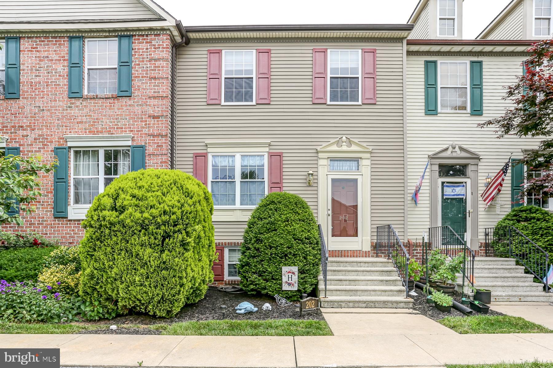 Welcome home to this beautifully maintained 3-bedroom, 3.5-bath townhome! The first floor features lovely hardwood floors and a spacious deck with open views. The custom kitchen, crafted by Colonial Craft Kitchens, showcases maple cabinetry, quartz countertops, a breakfast bar, a gas oven/range, and stainless steel appliances. Clever storage abounds with pull-out shelves in the pantry, a pull-out spice rack, and many other custom cabinet features to explore. Enjoy the convenience of second-floor hall laundry, accompanying the 3 bedrooms and 2 full baths on this level. The daylight lower-level family room, currently being used as a 4th bedroom, includes a tastefully decorated full bath with a shower stall. Additional Recent updates include new carpet in the lower level, new vinyl plank flooring upstairs, a freshly renovated staircase, and a new water heater. This home is truly move-in ready, schedule a tour today! Back on market to no fault of sellers. Buyers financing fell thru.