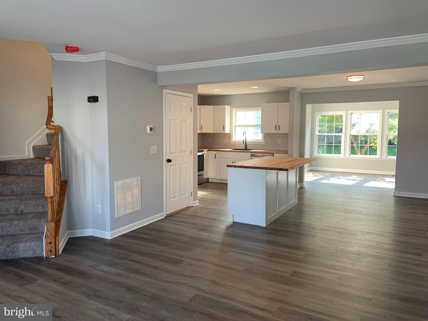 Newly renovated 3 bed, 2.5 bath townhome in Prentiss Point subdivision.  This home has so much to offer including an open concept layout and ample square footage.   This is a large 3 level home with brand new luxury vinyl plank on all 3 levels. The only carpet is on the 2 staircases.  All the flooring in the home is new and there is fresh neutral grey paint throughout the house.  The kitchen boasts new butcher block counter tops and a large new island.  The white shaker cabinets were just installed along with brand new appliances.  There is a large bonus room  right off the kitchen for all your entertaining needs.    On the second level you will find a very large primary bedroom with a master bathroom complete with soaking tub, new floors and new vanity.  There are 2 other secondary bedrooms and a secondary full bath.  It should be noted all the light fixtures are new in this home as well.   On the lower level you will find a large finished room for entertaining, a very large laundry room which includes the washer and dryer and another rough in for a future half bathroom.  This home is ready for it's new owners to move right in and enjoy everything 110 Vintage Court has to offer !