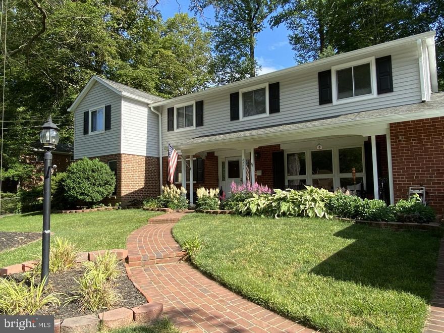 Beautiful home in sought after Kings Park!! Many updates! Two level addition, almost 3,000 sq/ft home!! New roof  2015,  new siding 2019,  new garage door 2013 with keypad entry, water heater 2014, furnace and HVAC 2016, disposer 2020, updated patio 2020, new gutters 2020.  Kitchen has granite countertops and ceramic backsplash, central vac system, crown molding, "Georgetown" style patio off kitchen/breakfast area for private entertainment! Large master bedroom with a great big walk-in closet, and grand bath!! Tons of storage space through out the home! Home is partially fenced, with two patios! This home has REAL hardwood floors!! Prime location, amazing schools, great neighborhood, in a cul-de-sac, minutes to I-495, I-395, and I-66. Must see!!