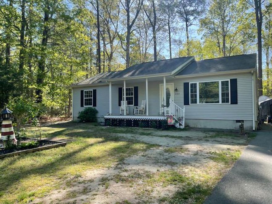 Motivated Seller! Freshly painted living room in this affordable Coastal Living in Captain's Cove! Welcome to this charming 3-bedroom, 2-bath rancher built in 2008, ideally situated in the heart of Captain's Cove. This well-maintained home features updated laminate flooring throughout the main living areas and a recently refreshed hall bath with a new vanity. The spacious guest bedrooms offer generous closet space, while the private primary suite provides a comfortable retreat with its own full bath. Step outside to a shaded backyard with a storage shed and a paver patio—perfect for relaxing or entertaining. Enjoy all the amenities this vibrant waterfront community has to offer, including a golf course, marina, 3 swimming pools, fitness center, and parks. Don’t miss this great opportunity to own in one of the Eastern Shore’s most sought-after communities.