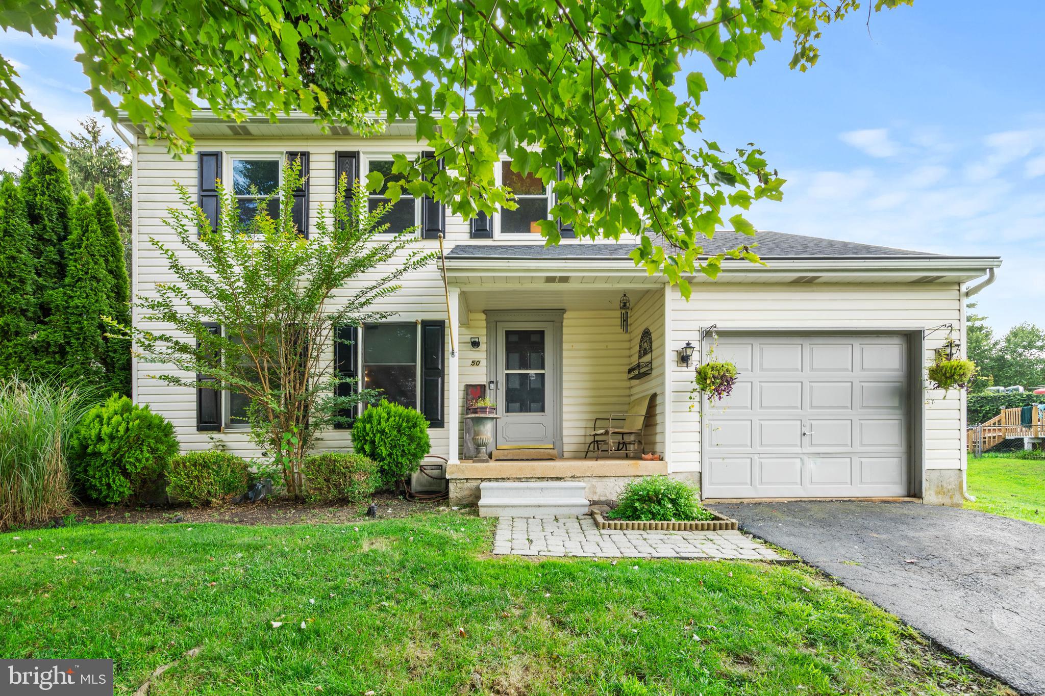 **REDUCED PRICE + SELLER ASSIST AVAILABLE THROUGH 9/15. ** You’re going to love everything this charming home has to offer! Nestled on a quiet cul-de-sac in the heart of Honey Brook, this spacious 4 bedroom, 2.5 bath property is the one you’ve been waiting for. Step inside to a welcoming first floor that offers the choice to cozy up in the inviting living room, complete with a beautiful brick fireplace, or head straight to the heart of the home - the kitchen. With generous counter space, abundant storage, and easy access to every corner of the house, this layout is perfect for everyday living and entertaining alike. Completing this level are a convenient half bath and a bright dining room with direct access to the rear yard. Upstairs, you’ll find a spacious primary bedroom with private access to the shared hall bath, along with two additional bedrooms. The lower level offers a fully finished basement that adds flexible living space, including a fourth bedroom with its own attached full bath making it ideal for guests, a home office, or playroom. A dedicated laundry room with extra storage rounds out this level. Enjoy easy parking with an oversized one car garage and a driveway for additional vehicles. The garage also includes a built-in workbench and convenient access to the backyard. Out back, the fully fenced yard is a true highlight offering multiple cozy nooks for relaxing, entertaining, or simply soaking in the peaceful surroundings. Don’t miss the opportunity to see this home in person. Schedule your tour today!