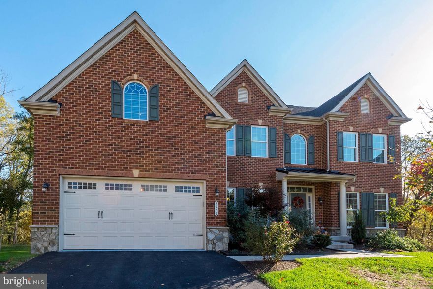 Stunning home backs to Patapsco State Park! Glossy hardwoods throughout the main level. Great room w/19ft vaulted ceiling, gas FP, floor to ceiling windows & columns. KIT w/stainless, granite, island w/breakfast bar & morning room w/access to Trex deck. Owner's suite boasts tray ceiling, sitting room, private deck & WIC. LL w/5th bedroom, full bath, rec room, wet bar & walkout to patio & firepit!