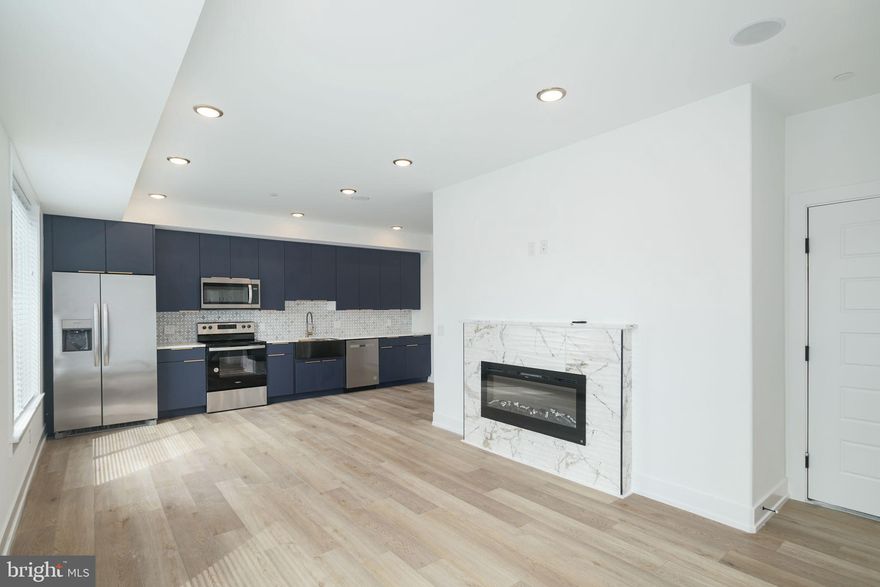 Welcome to 2000 N Front St , a brand new construction apartment complex with exceptional build quality. This includes calcutta quartz countertops, stainless steel appliances & sinks, soft close cabinets, electric fireplace & spacious custom closets, floor to ceiling tile bathrooms with LED mirrors. In addition, there are modern upgrades such as an alarm/intercom system, built in speakers, keyless entry/door codes,  an in-unit stackable washer/dryer.. There is an elevator for convenience that takes you to each of the 4 residential floors and the basement provides storage for your bike!

All electric building, no gas. This apartment complex is in close proximity to major roadways, public transport & is a stones throw away from some of the best restaurants in Fishtown (LMNO & Kalaya).

**Advertised rent is based on 1 month free (6th mo is free) at $1450/mo  for 12 month term. 

Tenants are responsible for the following utilities: 
Water $50/mo flat fee (up to 2 people)
Electric (based on usage) 
Internet