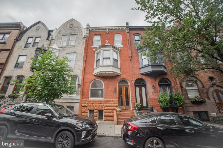 5 unit Rowhouse a half block from Schuylkill River Park, easy access to shops, markets and universities.
Original tiled entry foyer with wood wainscotting.  1 floor front is a studio with wood floors, and split system heating and cooling unit.  1 floor rear is a bilevel one bedroom with a bay window.  Upper level is the bedroom with wood floors and tiled bath. Lower level is the living room and kitchen with updated laminate floors. There is access to a rear patio. This unit also has split system heating and cooling.  2nd floor front is a one bedroom with wood floors and a bay window in the living room.  2nd floor rear is a studio with wood floors, bay window and tile bath. 3rd floor is a two bedroom, the tiled bath has a new vanity, the kitchen has new quartz countertops, open to the living room wood floors and a balcony.  This unit also has split system heating and cooling.   There is a gas fired boiler for the second floor units and a washer/dryer for all the tenants in the basement.   The property is in good condition in a great location.