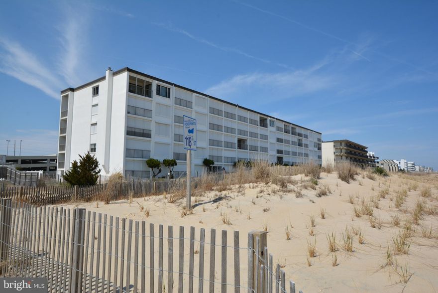 Start your day inspired with stunning sunrises from your fifth floor direct oceanfront balcony in this ideally located mid-rise building with elevator. Enjoy easy coastal living in this turn-key unit located in north Ocean City, close to restaurants, coffee shops, entertainment, shopping, and recreational activities. This home has many recent upgrades, including newer furnishings, fresh paint, laminated flooring, updated light fixtures, newer AC wall unit, oven replaced last year, new kitchen sink with new faucet and new garbage disposal, new toilets in the bathrooms, and new granite countertop in the kitchen. Exterior of unit features oceanfront balcony and electric hurricane shutter. This unit includes one assigned parking space with additional overflow parking for guests in the parking lot. Low condo fees. Enjoy ease of access to the beach with a north and a south side dune crossing. Rental income average $16,000 with owner blocked usage of 6 weeks. Rental potential up to $20,000 in peak season.