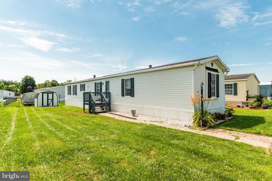 *IMPORTANT NOTICE* 
Property taxes are an estimate! Must contact the Berkeley County, WV, Tax Assessor's Office to get an exact annual amount. Park approval required. Lot rent is $520/month and includes trash ONLY. *

Welcome Home! This well-maintained 3-bedroom, 2-bath home is located in a managed community just outside of Martinsburg—close to popular dining, shopping, and convenient commuter routes. Whether you're just starting your homeownership journey or looking to simplify with a more manageable space, this home offers comfort, function, and value.

Inside, you'll find a bright and open layout with ample counter space in the kitchen—perfect for everyday meals or entertaining. The spacious primary suite includes a private bath with a large soaking tub, ideal for relaxing after a long day. Two additional bedrooms provide flexibility for guests, a home office, or hobbies.

An 8'X8' storage shed is included, offering additional space for tools, seasonal décor, or outdoor gear. Enjoy the benefits of community living with the freedom of your own space.

Schedule your tour today and see the possibilities this lovely home has to offer!