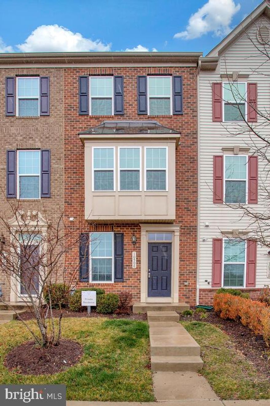 Why wait for new construction when you can move right into this like-new brick-front townhouse located in sought-after Westphalia Town Center? Offering an expansive living space, this contemporary 4-level colonial style home with 4 ft extension and modern finishes boasts 3 bedrooms, 1 loft (potential 4th bedroom), 3 full bathrooms, and 1 half bathroom. As you enter this move-in gem you will be greeted by a hardwood entryway that leads to a practical entry-level bedroom with an en-suite bathroom. This entrance level also offers an over-sized attached garage with easy access to the home. The next level is graced by more hardwood floors and houses the heart of the home, an airy and light-filled eat-in luxury kitchen complete with recessed lighting, stainless steel appliances, gas stove, built-in microwave, elegant granite countertops, a large island, double sinks perfect for food preparation, charming breakfast bar, quality maple espresso cabinets for ample storage, and a walk-in pantry. Off the kitchen lies a very relaxing balcony, a half bathroom, and an open family/living space perfect for entertaining. The third level includes the first of two primary suites featuring an elegant tray ceiling and an attached dual entry bathroom with a walk-in closet, dual sinks, and a water closet. Also on this level, there is a sizable loft that can potentially be converted into an additional bedroom or used as a sitting area/office. The washer and dryer are conveniently on this level as well. On the top level, the second primary suite with an en-suite bathroom, walk-in closet, and a crawlspace for added storage provides the perfect space for guests or a second home office. Equipped with security and fire sprinkler systems for peace of mind, this home which is conveniently located off of MD-4/Pennsylvania Ave, minutes from I-495, Suitland Pkwy, and Andrews Air Force Base, and only 10 miles from DC lies in an amenity-rich community with an existing doggie park, amphitheater, and multiple gathering areas. Plus, lawn maintenance is included! And if this wasn't enough, future community amenities will include a pool, a clubhouse, retail shopping, and more. Make this commuter's dream home yours today!