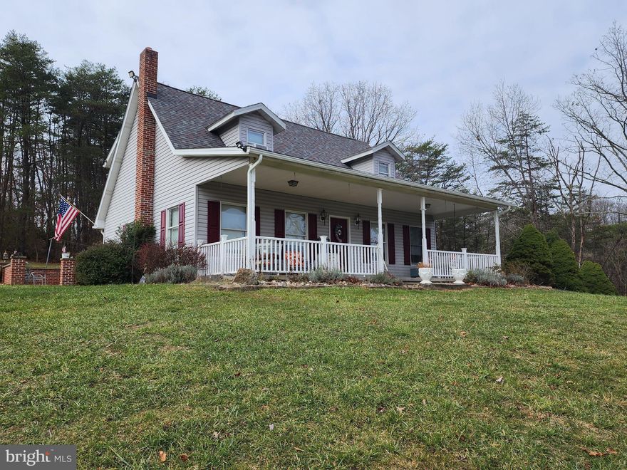 Have you been waiting on your private setting in West Virginia to go on the market? Well, here is your chance to own this lovely 4 bed, 2.5 bath home on 1.68 acres. The home features a main level primary bedroom with private bath, hardwood floors, granite countertops, 1/2 bath and sizeable living room. The upper level offers 3 addtional bedrooms and a full bath with double sink vanity. In the lower level you will find a finished family room with a wood burner, laundry and a ton of extra storage space. There are amazing mountain views and at the edge of the property you can overlook the dam. Relax on your front porch swing or on your patio off of the kitchen all while enjoying your private setting. There are not 1, not 2 but 3 storage sheds for your extra storage needs. Don't let this one pass you by. Call for your showing appointment today.