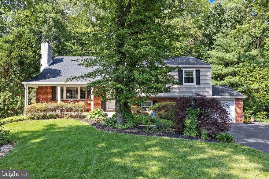 Will you be the new guardian of this Gorgeous Home? Gorgeous private location...over $120,000 in improvements.  Hardwood floors under carpet on first and second floors.  Step into the story of 106 Shady Lane, where You could be the fortunate next Owner.  Tucked away in the sought-after rarely offered Montgomery Woods neighborhood, this home stands apart with its serene backyard oasis—a rare gem in today's bustling world.

Upon entering, the foyer welcomes you to a main level that seamlessly blends elegance and functionality. To your left, a formal living room opens gracefully into the dining and kitchen areas, anchored by a charming wood burning fireplace that promises cozy evenings and intimate gatherings.

The heart of this home, a kitchen remodeled in 2019, boasts wood cabinetry, a center island, and gleaming granite countertops—a chef's dream realized. From the dining area, step down into the family/sunroom, where walls of windows and skylights bathe the room in natural light. Here, cherished moments with loved ones unfold against the backdrop of a breathtaking backyard retreat, offering privacy that feels worlds away yet just moments from local conveniences (main roads, shopping, restaurants, regional rail and activities).

Ascending through four levels totaling 2810 square feet (which includes the expansive 389 sf family room), discover your sanctuary on the second level with three spacious bedrooms and two full baths. Each bedroom offers ample closet space, while the primary suite features a three-piece bathroom.

Venture to the third level to find a large bedroom with cozy sitting area and abundant storage.  Yet another floor awaits above this level, the floored attic with a thermostat attic fan.  The lower level beckons with a family room/library, office space, and a convenient laundry room with a half bath. Accessible from this level, the garage and a side entrance provide effortless transitions from the outside.

Below the lower level you will find a basement level which has additional space, a rubberized floor in the exercise area and  carpet in the play area… just more room to expand into.  A workshop, utility room, and storage areas complete this basement level.

With over $120,000 invested in thoughtful upgrades and renovations, this home reflects pride in ownership and a commitment to quality living.  The photos capture the essence of this remarkable property, where every detail speaks to a life well-lived.

Embrace the opportunity to make 106 Shady Lane your own—a place where home isn't just a destination, but a story waiting to unfold.