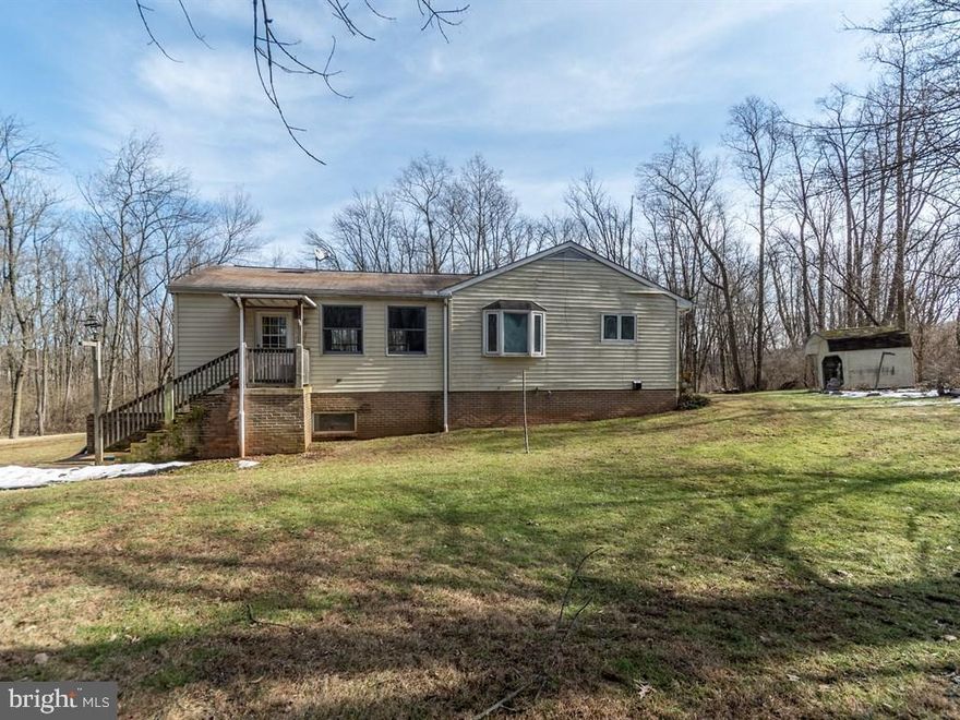 3 bedroom, 2 bath single family home with main level family room plus an additional lower level family room. 7 plus acres with wonderful views.