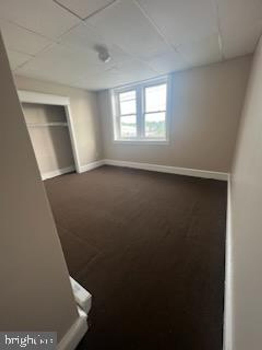 Freshly painted 3rd floor apartment.  2 bedrooms, eat in kitchen area, spacious living room and 1 bathroom.   Unit also has a back staircase leading outside directly from the apartment.  Quick move in available.