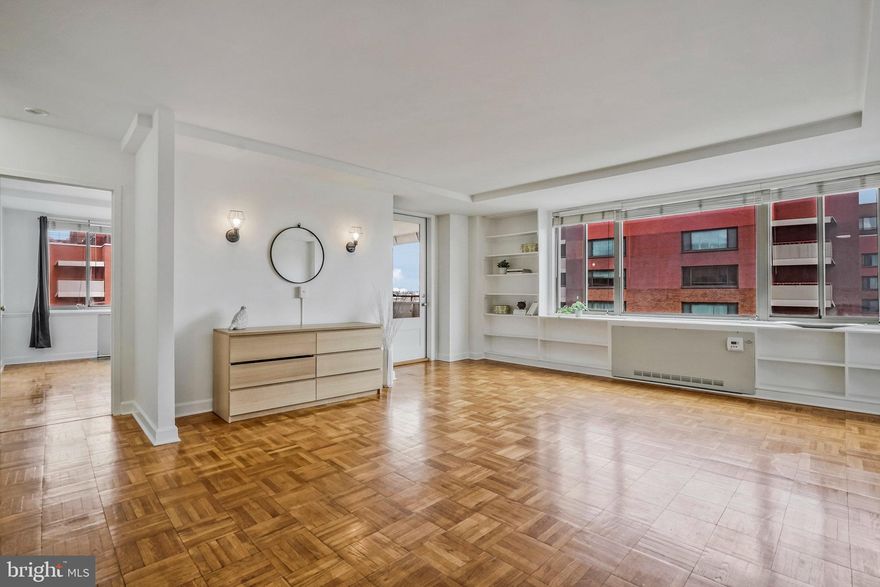 Welcome to your urban oasis nestled in the heart of Rosslyn, VA, just moments away from the bustling energy of Washington, DC. This meticulously maintained 1-bedroom condo offers a perfect blend of modern convenience and comfort, boasting an array of desirable features to enhance your lifestyle.

Upon entering, you'll be greeted by the abundance of natural light streaming through the large windows, illuminating the spacious interior. The open layout seamlessly connects the living and kitchen area, creating an inviting space for both relaxation and entertainment.

The generously sized bedroom provides a tranquil retreat, complete with ample closet space to accommodate your wardrobe and storage needs. The bathroom and kitchen have been tastefully updated, showcasing nicely appointed finishes and fixtures for you to enjoy.

Freshly painted walls and gleaming hardwood floors throughout add to the allure of this exceptional unit, creating a warm and welcoming ambiance.

Beyond the confines of your home, indulge in the wealth of community amenities at your disposal. Take a refreshing dip in the outdoor pool, maintain your fitness routine in the expansive fitness center equipped with sauna and steam room, or challenge friends to a game of pool or table tennis in the recreation area.

Conveniently located just minutes from the Rosslyn Metro station, commuting to downtown DC and beyond is a breeze. Additionally, you'll find yourself within close proximity to the vibrant dining and shopping scene at Assembly Foodhall, offering an array of trendy eateries and boutiques to explore at your leisure.

Don't miss this opportunity to experience the epitome of urban living in one of Rosslyn's most coveted condominium communities. Schedule your private tour today and make this your new home sweet home!