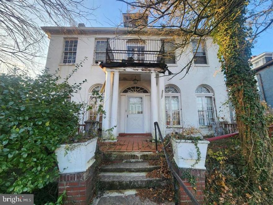 Massive single-family home in need of full rehab. There is a partially finished attic for additional space and an alley-facing two-car garage. Potential multi-family usage with a second story entry/exit in the rear. Sold As-Is, Cash/ Hard Money.