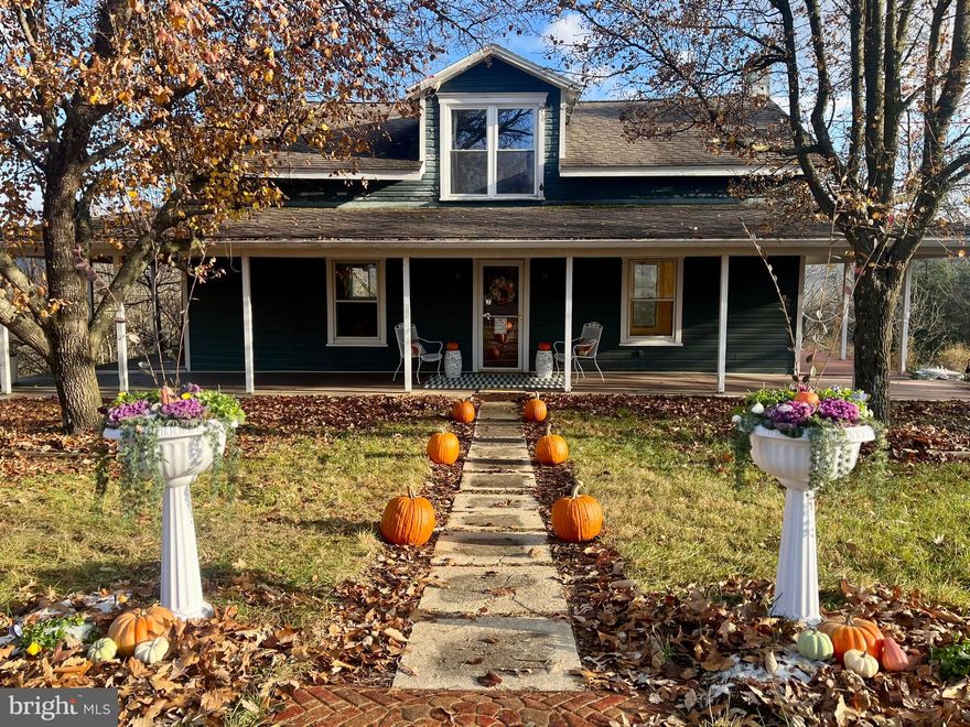 Seller offer $5000 credit toward buyers closing costs with acceptable offer!!!  Gorgeous Location!!!   Pasture/Forest view Spring/Summer with Mountain view Fall & Winter!  Interior updated and in excellent condition!  Rare, cozy atmosphere you've been looking for!  15 Min to ROCKY GAP Golf Course, Casino & Resort featuring the only Jack Nicklaus Signature Golf Course in Maryland per their website!   Spa, Beach area, restaurants & comedy club!  This fresh & lovely home offers Beamed ceilings, TWO FULL UPDATED Baths - one on each level! Kitchen features Granite counters & Stainless appliances!  Quarter Sawn White Oak floors installed on main level in 2016, Oil Fired Boiler (installed 2016) Hot Water Baseboard Heat along with Wood Stove!  Fuel Oil tank full and ready for winter!  100 gal Propane tank (owned) just filled!  NEW Well Pump & Pressure Holding Tank Installed August 2025 by Sperry Drilling.  Septic pumped/insp 8/29 ALL GOOD!  Disturbed dirt pile in rear yard is access point to septic, well chlorinated, NEW Hot Water Heater Sept 2025!  Property serviced by 2 wells.  Seller has 2nd one as back up but could be isolated for exterior use (trough for livestock, irrigation for garden?) Home Exterior, barn & outbuilding need work - Drapes on left side porch & Print on right side porch for decoration ok to look behind (carefully), live in the beautiful interior and complete exterior overtime - perfect for the DIY generation! Roadside Outbuilding could make a great vegetable stand or renovate into detached garage or workshop - seller advised to leave as-is to simplify renovation process - call for details.   Property runs fence line to fence line - orange markings on road (far side) - fence line in forest marks eastern boundary, add fencing along roadside to create great pasture for horses or other animals - plenty of room!   Barn could easily be repaired for great cover/storage facility.  Currently winterized, seller in process of water testing and a few other repairs to insure all is ready for the new owner!!   More info to follow!  Per legal description in Deed - Lot extends to west side of road and Seller intends to KEEP that Parcel TWO Approx. .76 ac (approx 80' deep x430' roadfront) on west side but will consider negotiating.  House sits on Parcel ONE approx 3.8 ac.  (approx. 480' deep x430' roadfront)   Deed in online documents.  PLEASE NOTE ASSESSOR MAP OVERLAY ON PUBLIC RECORD IS INCORRECT.   PLEASE NOTE AERIAL IN ONLINE ATTACHMENTS FOR APPROXIMATE BOUNDARY.  Please do not park on front lawn - use carport area or park on grassy area across the road.  Selling As-Is.  Please use caution on porches & deck - no railings or open railings, tripping hazards, outbuilding and barn - use caution and enter at own risk.  Note right rear corner by propane tank.   Chimney only for vent to oil fired boiler - appropriate operation confirmed by masonry contractor - 2 exterior holes but flue is intact, possible to direct vent boiler thru basement wall and remove chimney or patch exterior for cosmetic repair.