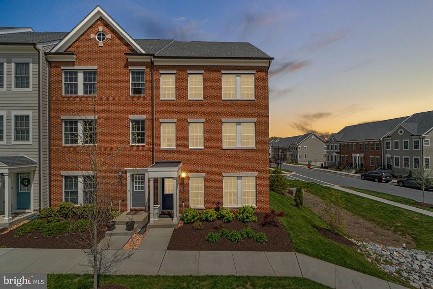 Welcome to 1115 Owen Way, nestled in the highly desirable community of Parkside at Woodside! This beautifully maintained, like-new home showcases neutral finishes and thoughtful upgrades throughout.
Step inside from the covered front porch to a spacious lower level featuring luxury vinyl plank flooring, recessed lighting, a large family room with an electric fireplace, a full bath, mudroom, and garage access. The oversized garage is equipped with built-in shelving, an electric vehicle charger, and sleek epoxy flooring.
Upstairs, the main level impresses with 9-foot ceilings, more LVP flooring, and an open-concept layout that's ideal for entertaining. The upgraded kitchen is a true showstopper with 42" light gray cabinetry, quartz countertops, a massive island with seating and custom pendant lighting, a butler's pantry, stainless steel appliances, a separate pantry, dual ovens, and an abundance of storage space. The bright and airy family room is flooded with natural light, while the large dining area features a stylish door that opens to the rear deck. A convenient powder room and motorized blinds complete the main floor. The upper level features a stunning primary suite with custom moldings, a generous walk-in closet, and a spa-like en-suite bath with a walk-in shower, bench seating, dual vanities, and tasteful fixtures. Two additional spacious bedrooms offer ample closet space, and you'll also find a second full bath and laundry on this level for added convenience. Parking is a breeze with an attached garage, driveway, and plenty of street parking. Just a short walk through the nearby tunnel leads you to a family-friendly water park with a splash pad, as well as charming downtown Sykesville, home to boutique shops, restaurants, and year-round community events. Don’t miss your chance to own this stunning home. Schedule your showing today!