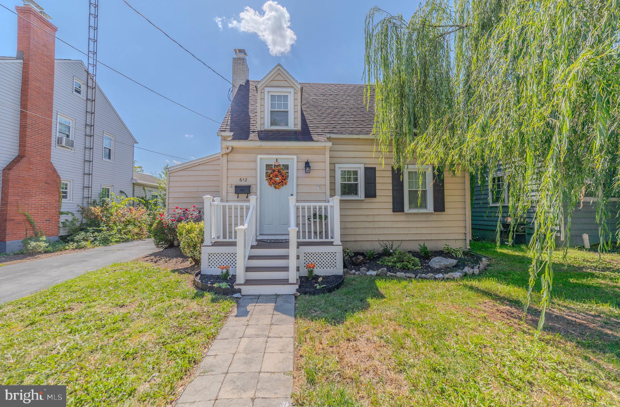 Back on the market due to buyer's financing falling through, another chance to make this beautiful home yours!
Charming Cape Cod with thoughtful updates, featuring 2 bedrooms and an optional 3rd room in the basement for flexible use. The updated kitchen boasts new cabinets, sleek appliances, and fresh paint throughout. Cozy up by the wood-burning fireplace, recently restored and ready for use. Outside, enjoy a spacious, flat, fenced-in backyard with a single detached garage, perfect for storage or a workshop, along with a patio deck ideal for entertaining. The property also offers a personal driveway that wraps around to the rear of the house, leading to a covered carport. While the basement includes an unfinished family room and shower, it offers great potential for customization. Beautifully decorated, the home’s furniture is also available for purchase, making this property move-in ready with room to grow!