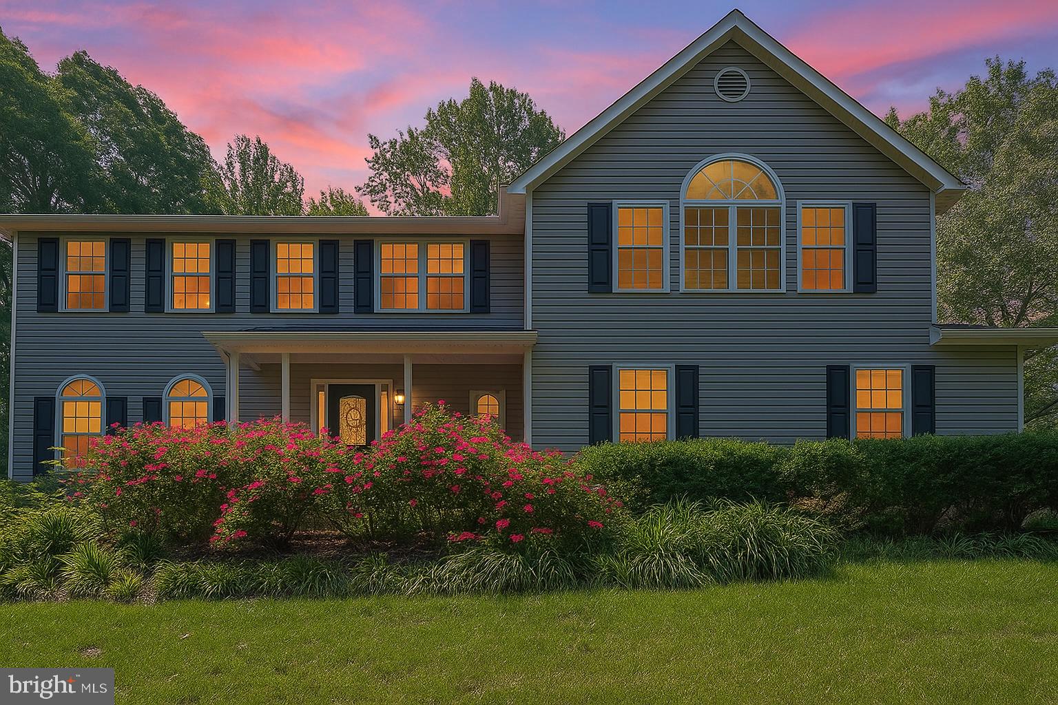 Welcome to 310 Owings Hill Court, an exceptional home nestled on almost 3 acres in a serene, wooded setting at the end of a quiet cul-de-sac. With nearly 5,000 square feet of living space, this five-bedroom, 3.5-bath residence offers the perfect blend of comfort, elegance, and functionality.
The main level offers a spacious, light-filled layout that’s perfect for both everyday living and entertaining. Expansive windows throughout the home flood each space with natural light, including the sun-drenched living room, the cozy family room, and the library with custom built-ins. A stunning sunroom with a stone floor seamlessly brings the outdoors in. The gourmet kitchen features granite countertops, stainless steel appliances, and a generous walk-in pantry, while a centrally located half bath adds convenience for guests and daily life.
Upstairs, the second level features an expansive primary suite with soaring vaulted ceilings and a luxurious en suite bath adorned with elegant Carrara marble—creating a true spa-like retreat. Two additional generously sized bedrooms offer walk-in closets and remote-controlled window shades, while a full hall bathroom and a convenient upper-level laundry room add comfort and ease to everyday living.
The fully finished walkout basement offers exceptional flexibility for entertaining, hosting guests, or multi-generational living. This level features a custom wet bar, two spacious guest bedrooms, and a full bathroom. There’s also plenty of room for a dedicated gym, play area, or additional storage, depending on your needs. At the heart of the lower level is a private 6-person home theater, complete with tiered seating, reclining chairs, cinematic lighting, surround sound, and Wi-Fi connectivity—perfect for immersive movie nights or streaming your favorite shows in comfort and style.
Step outside to an expansive composite deck that wraps around the back of the home, featuring a large pergola and a hot tub—perfect for hosting gatherings or simply relaxing while surrounded by nature. A year-round stream runs through the property, and a charming chicken coop adds to the idyllic, country feel.
Enjoy the tranquility of nature without sacrificing convenience—located in the highly rated Calvert County Public School District, this home offers easy access to shopping and dining in Dunkirk, Chesapeake Beach, and North Beach. It’s also within commuting distance to Annapolis (30 mins), Joint Base Andrews (35 mins), and Washington, D.C. (45 mins). Outdoor recreation abounds with nearby Hallowing Point Park, local trails, and marina access at Herrington Harbour.