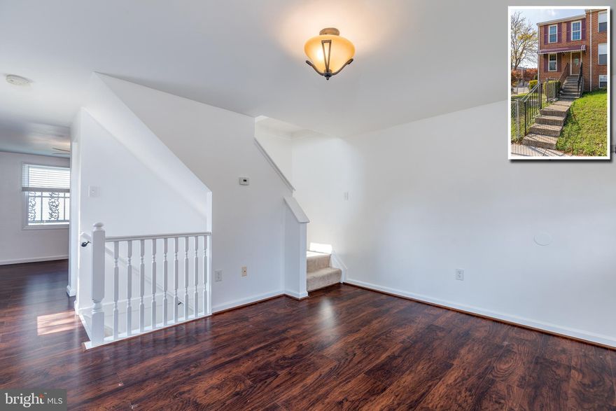 MOVE IN READY END OF GROUP ROWHOME WITH 3 FINISHED LEVELS & A FENCED YARD! Vinyl wood flooring throughout the main level, spacious living room, large eat-in kitchen w/ ss appliances, upper level with 2 bedrooms and 1 full bath, fully finished basement w/ a family room or 3rd bedroom, full bath, and laundry room, rear patio, and a fenced yard! Pack your bags and move right in!