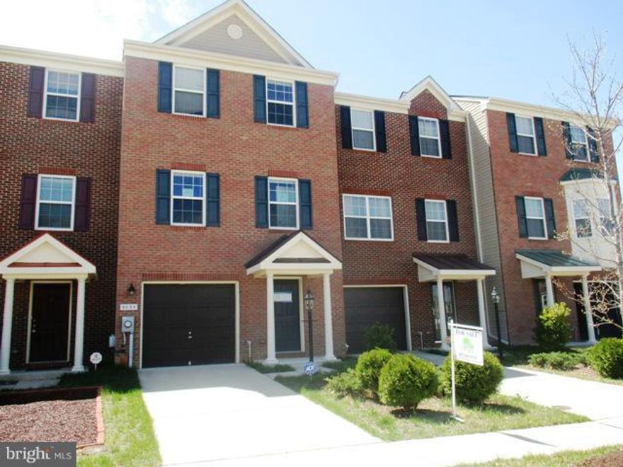 **PRICE HAS BEEN REDUCED** Nice 3 level, brick-front townhome with 1 car garage features 3 bedrooms,  2.5 bathrooms, open kitchen w/center island, granite top & beautifully crafted cabinets, separate living and dining room. Master bedroom has walk-in closet, vaulted ceilings and a full bathroom with separate shower. Finished main level rec room leads to rear yard for outdoor fun. Sold as-is.