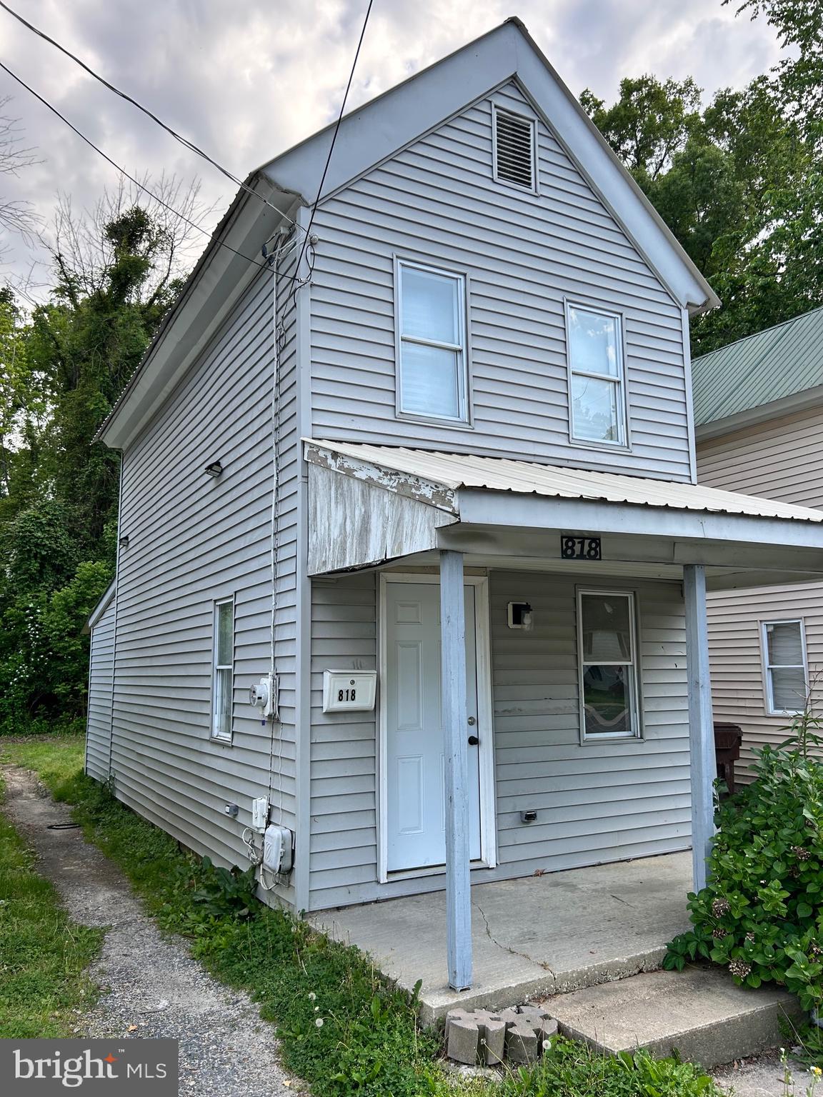 Sold as is - rehab work started but not completed. Cute home with lots of potential! Previously used as a rental with good income! Located in downtown Cambridge close to schools, recreation and downtown allure!